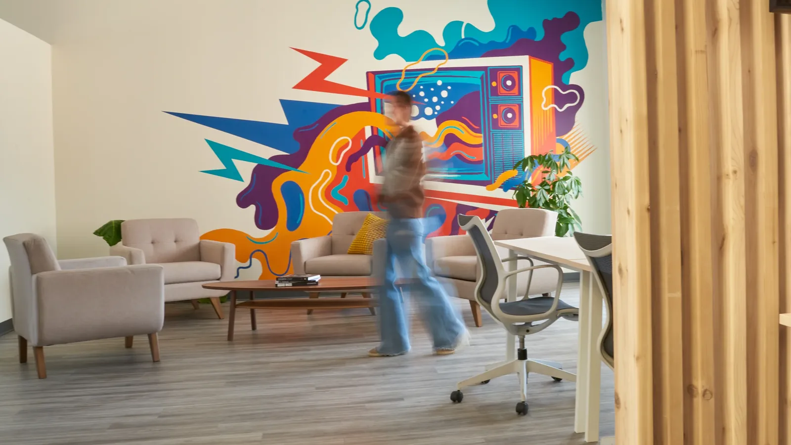 The lounge and mural wall at the Colour and Code studio.